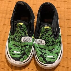 Kids Green Hulk Slip-On vans (one has a rip not fully through (see photo)